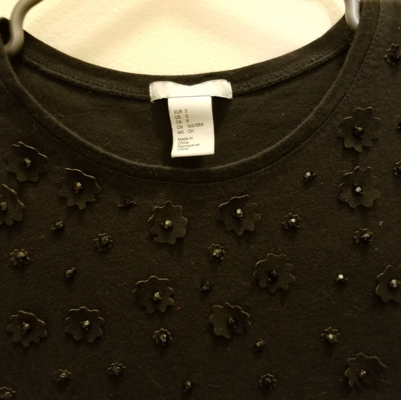 2/$20 H&M t shirt with floral embellishments - Picture 2 of 3